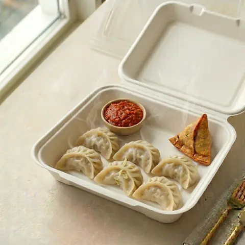 Illustration of a dish from The Momo Spot
